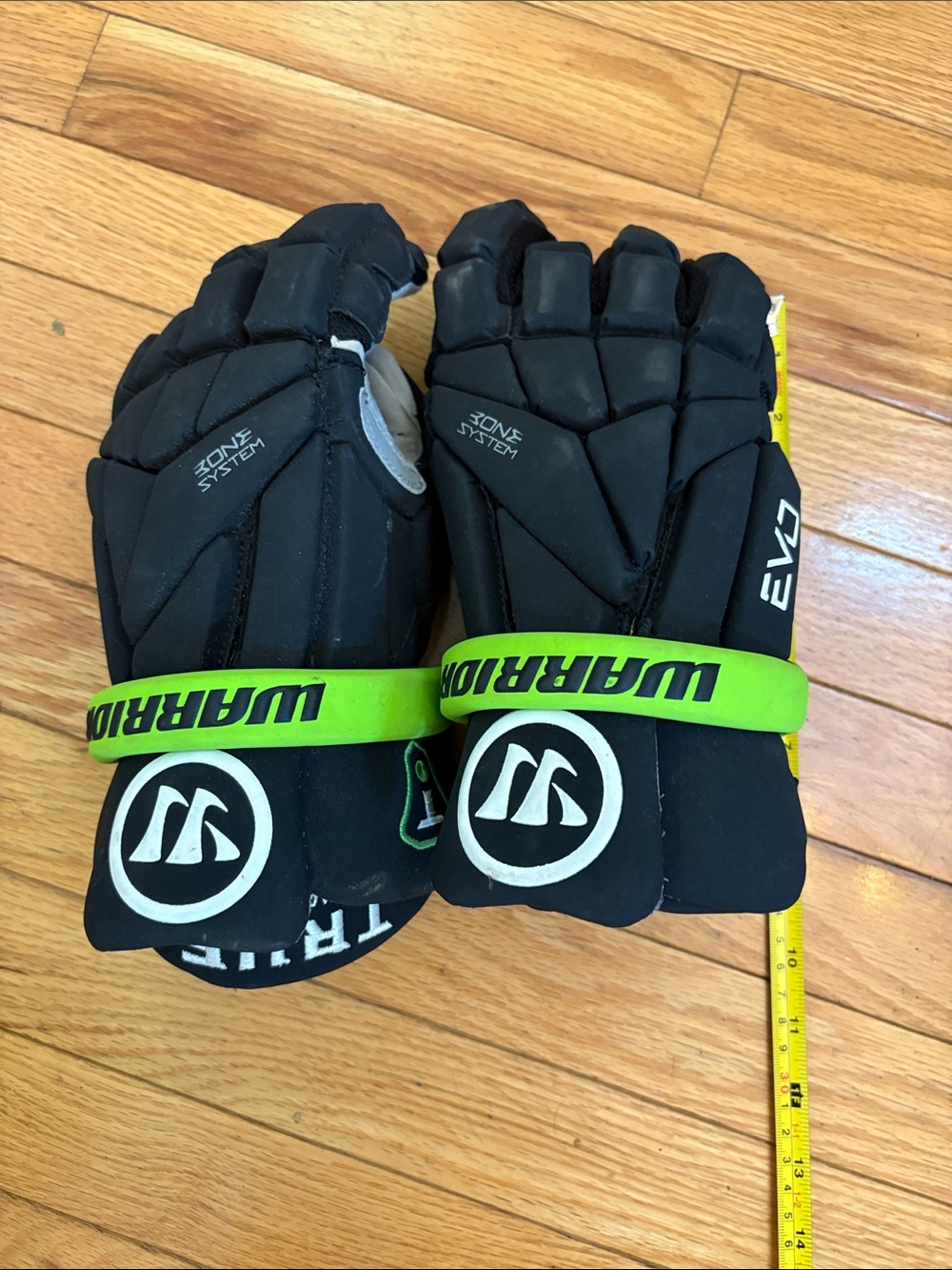 Warrior EVO Black Youth Lacrosse Gloves with Neon Green Strap